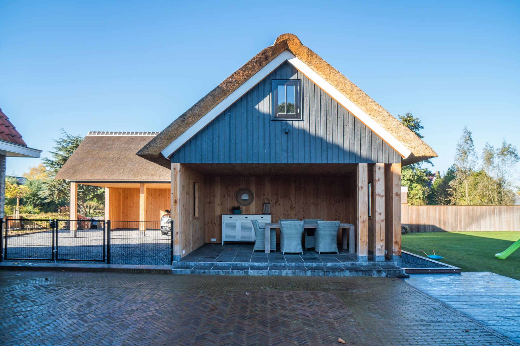 afbeeldingSchuur met carport Noorden