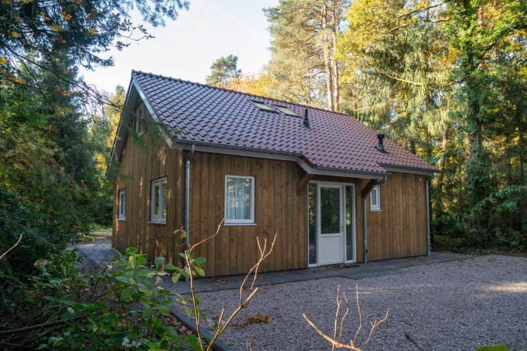 Een houten recreatiewoning die comfortabel en bijzonder is