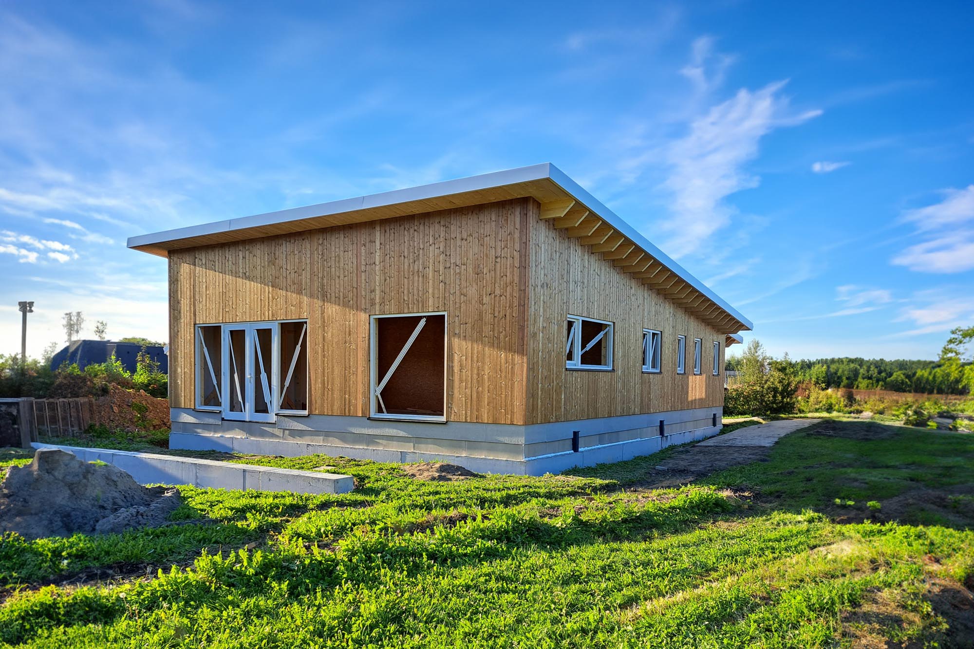 lessenaarsdak-houten-woning