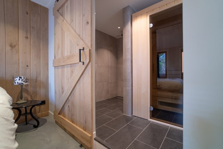 Tuinhuis met sauna bouwen: genieten in ieder seizoen!